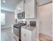 Well-equipped kitchen featuring stainless steel appliances, granite countertops, and white cabinetry at 574 Altamonte Dr, Clover, SC 29710