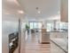 Modern kitchen featuring stainless steel appliances and a seamless flow into the cozy living room at 574 Altamonte Dr, Clover, SC 29710