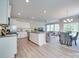 Bright open-concept space with a kitchen, dining area, and cozy living room, perfect for entertaining at 574 Altamonte Dr, Clover, SC 29710