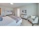 Comfortable main bedroom with plush carpet, a sleek cabinet, and soothing neutral tones at 574 Altamonte Dr, Clover, SC 29710
