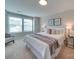 Bright main bedroom with plush carpeting, a large window, and neutral decor at 574 Altamonte Dr, Clover, SC 29710