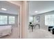 Bright office featuring black desk, neutral paint, carpet and view into an adjacent bedroom at 574 Altamonte Dr, Clover, SC 29710
