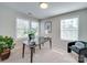 Bright office featuring black desk, neutral paint, carpet and three windows at 574 Altamonte Dr, Clover, SC 29710