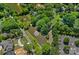 Aerial view showcases the community's lush landscaping, water features, and amenities at 5915 Mammoth Rd, Charlotte, NC 28270