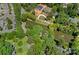 Aerial view showcasing the property's prime location, waterfront access, lush landscaping, and neighborhood at 5915 Mammoth Rd, Charlotte, NC 28270