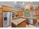 Modern kitchen with stainless steel appliances, granite countertops, and custom cabinets with a wine rack at 5915 Mammoth Rd, Charlotte, NC 28270