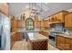 Well-equipped kitchen featuring stone countertops, a wine rack, stainless steel appliances, and lots of storage space at 5915 Mammoth Rd, Charlotte, NC 28270