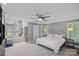 Tranquil main bedroom suite with sitting area, ensuite bathroom, and neutral color palette at 5915 Mammoth Rd, Charlotte, NC 28270