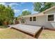 Backyard view of a spacious wooden deck, ideal for entertaining and outdoor enjoyment at 6007 Charing Pl, Charlotte, NC 28211
