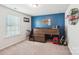 Stylish bedroom featuring a unique bunk bed design and cheerful decor on a blue accent wall at 6878 Spring Peeper Ln, Lancaster, SC 29720