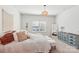 Cozy bedroom features soft carpet, a comfy bed, and a window with natural light at 6878 Spring Peeper Ln, Lancaster, SC 29720
