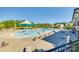 Community pool with separate areas for lap swimming and recreation, complete with plenty of lounging chairs and shade structures at 6878 Spring Peeper Ln, Lancaster, SC 29720