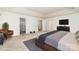 Spacious bedroom featuring neutral paint, carpet floors, and a walk-in closet at 7031 Woodbridge Valley Cir, Charlotte, NC 28227