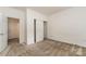 Bedroom with carpet, closet, and natural light at 7031 Woodbridge Valley Cir, Charlotte, NC 28227