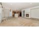 Open-concept living space connects the kitchen, living room, and dining area, great for entertaining at 7031 Woodbridge Valley Cir, Charlotte, NC 28227