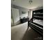 Bedroom features a bunk bed and black dresser against gray walls at 715 Larimer Ln, Charlotte, NC 28262
