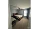 Cozy bedroom features a ceiling fan and natural light at 715 Larimer Ln, Charlotte, NC 28262