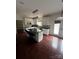 Modern kitchen features a center island, stainless steel appliances and hardwood floors at 715 Larimer Ln, Charlotte, NC 28262