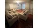 A living room features comfortable seating, natural light, and is ready for relaxation at 715 Larimer Ln, Charlotte, NC 28262