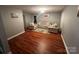This spacious living room is complete with a large sectional sofa and ceiling fan at 715 Larimer Ln, Charlotte, NC 28262