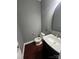 Cozy powder room with modern fixtures and tile floors at 715 Larimer Ln, Charlotte, NC 28262
