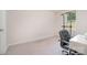Comfortable carpeted bedroom with a pull-up bar and an office chair near the bright window at 725 Pointe Andrews Dr, Concord, NC 28025