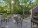 Spacious backyard deck with ample seating perfect for entertaining and relaxing outdoors at 8017 Nathanael Greene Ln, Charlotte, NC 28227
