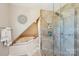 Elegant bathroom featuring a glass-enclosed shower, a soaking tub, and modern fixtures at 8056 Stevens Mill Rd, Matthews, NC 28104