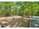 Community playground with swings surrounded by trees at 8056 Stevens Mill Rd, Matthews, NC 28104