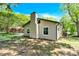 Backyard with well-maintained lawn, patio, and vinyl siding on the house at 8303 Hemby Wood Dr, Indian Trail, NC 28079