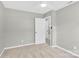 Neutral bedroom featuring plush carpeting, a ceiling fan, and ample closet space at 8303 Hemby Wood Dr, Indian Trail, NC 28079