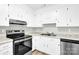 Efficient kitchen featuring white cabinets, stainless steel appliances, and practical countertops at 8303 Hemby Wood Dr, Indian Trail, NC 28079