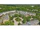 Overhead view of townhome community with manicured lawns and lush landscaping, showing cul-de-sac at 9204 Washam Potts Rd, Cornelius, NC 28031