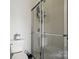 Bathroom with a glass-enclosed shower and neutral finishes at 9204 Washam Potts Rd, Cornelius, NC 28031