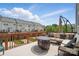 Outdoor deck with patio furniture and a fire pit, perfect for entertaining at 9204 Washam Potts Rd, Cornelius, NC 28031
