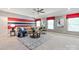 Cozy living room with comfortable sofa, decorative pillows, and unique accent wall at 938 Rock Forest Way, Fort Mill, SC 29707
