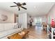 Open-concept living space with hardwood floors, seamless flow to dining area and kitchen at 1005 N Main St, Mount Holly, NC 28120