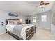 Bedroom with neutral tones featuring carpet flooring and an ensuite at 1005 N Main St, Mount Holly, NC 28120