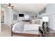 Comfortable bedroom with ensuite and ample space with neutral tones at 1005 N Main St, Mount Holly, NC 28120