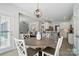 Open dining area view to kitchen and living room with great flow at 10223 Willingham Rd, Huntersville, NC 28078