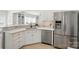 Bright kitchen featuring stainless steel appliances, and white cabinets at 10223 Willingham Rd, Huntersville, NC 28078