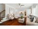 Comfortable living room area with stairs and open kitchen view at 10223 Willingham Rd, Huntersville, NC 28078