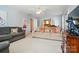 Comfortable living room with two sofas, decorative pillows, and an open doorway leading to a bedroom at 10223 Willingham Rd, Huntersville, NC 28078