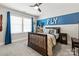 room with dark wood frame bed and decor at 1148 Wessington Manor Ln, Fort Mill, SC 29715