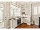 Butler's pantry with built-in wine cooler and wine rack at 1148 Wessington Manor Ln, Fort Mill, SC 29715