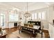 Dining room featuring wood table, bench seating, and decorative lighting at 1148 Wessington Manor Ln, Fort Mill, SC 29715