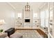Living room featuring custom shelving and an area rug at 1148 Wessington Manor Ln, Fort Mill, SC 29715
