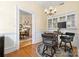 Cozy home office with built-in shelving and a round table perfect for focused work at 116 N Mulberry St, Statesville, NC 28677