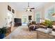Spacious living room with hardwood floors, crown molding, and plenty of natural light at 116 N Mulberry St, Statesville, NC 28677