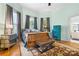 Bright, comfortable bedroom with classic design elements and abundant natural light at 116 N Mulberry St, Statesville, NC 28677